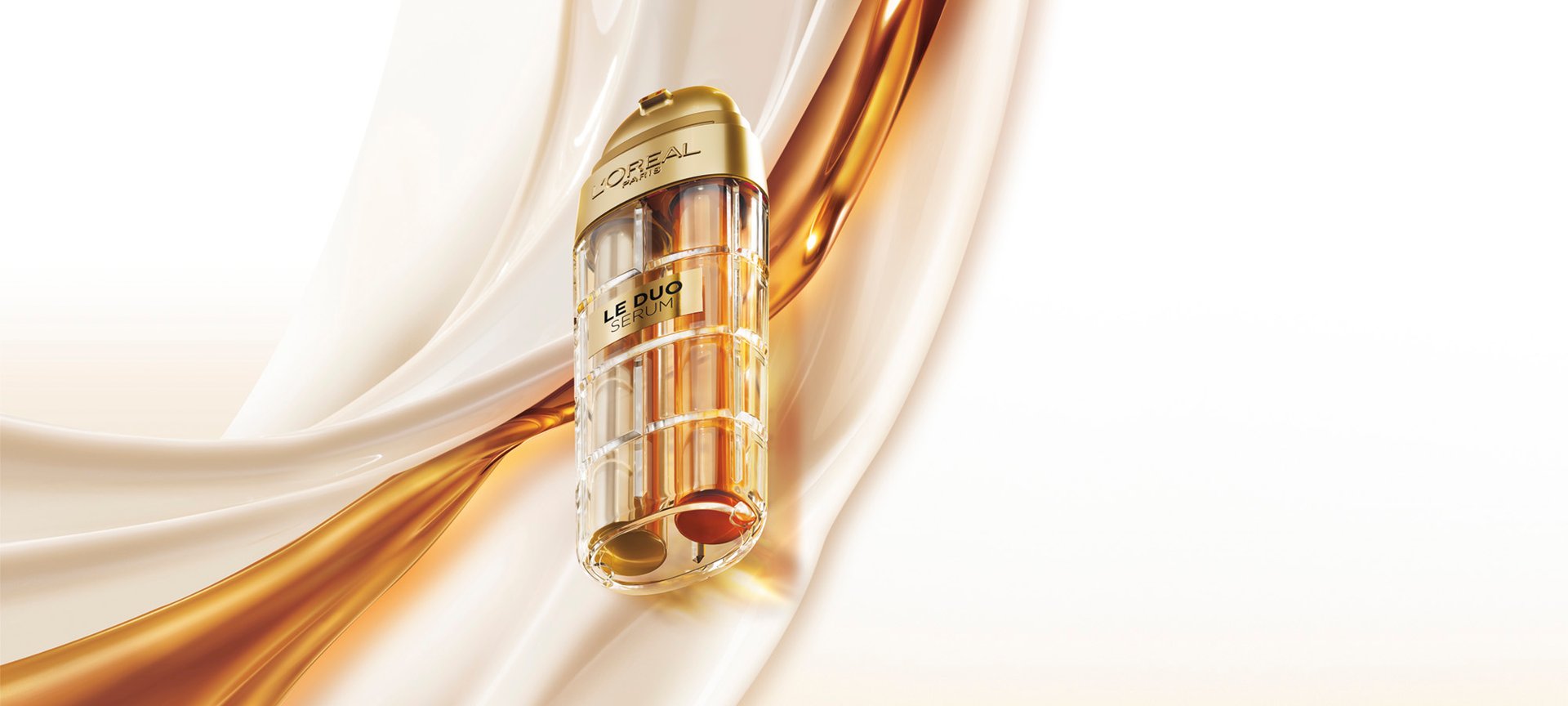 Commercial image of the L'Oréal Paris Le Duo Serum. The luxurious bottle, with gold accents and a transparent body revealing two distinct formulas (one clear and one amber), is presented at a diagonal angle. The background consists of smooth, silky waves of white and golden textures swirling together, symbolizing the power and richness of the serum blend.