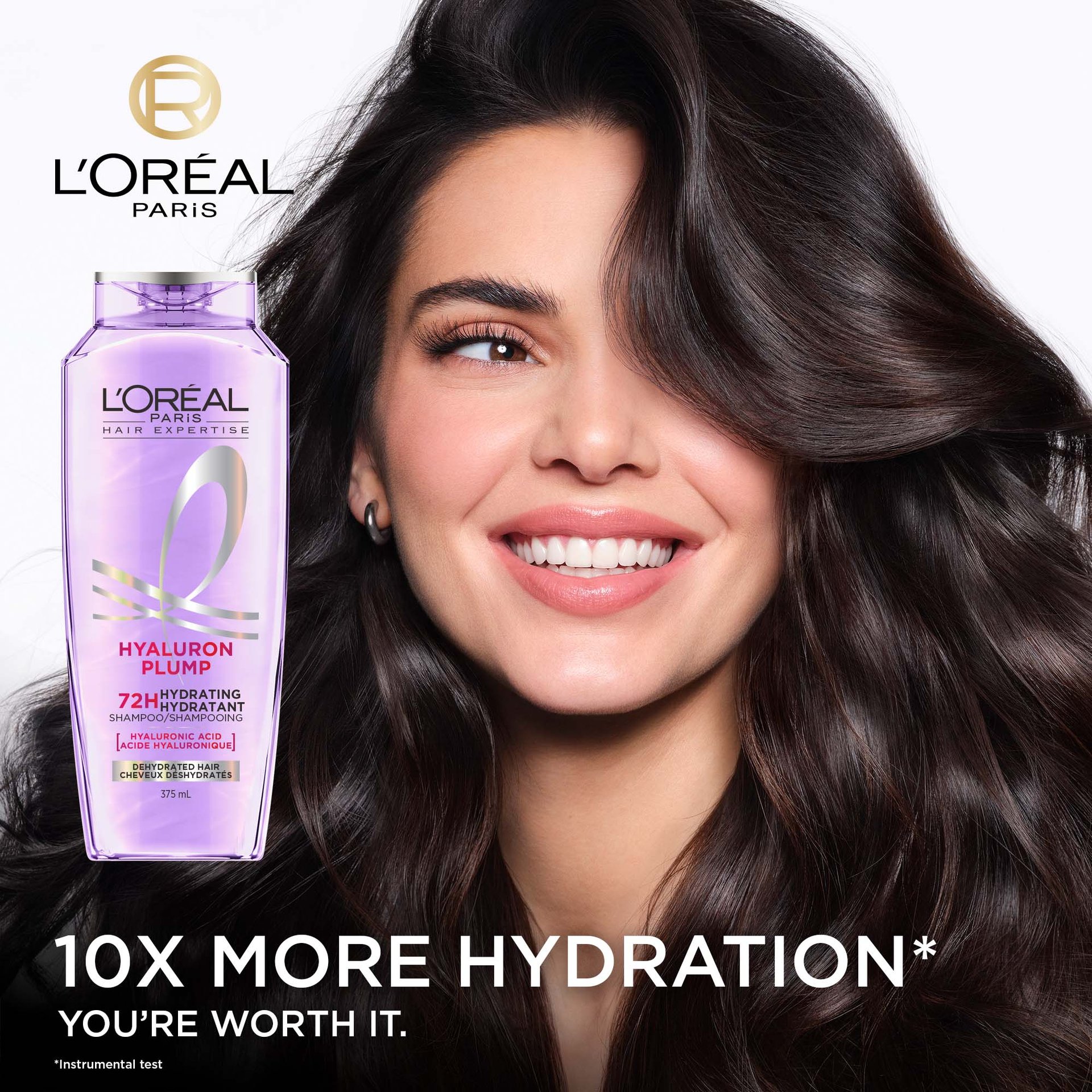 Kendall Jenner with plumped-up hair and a bottle of hyaluron plump shampoo