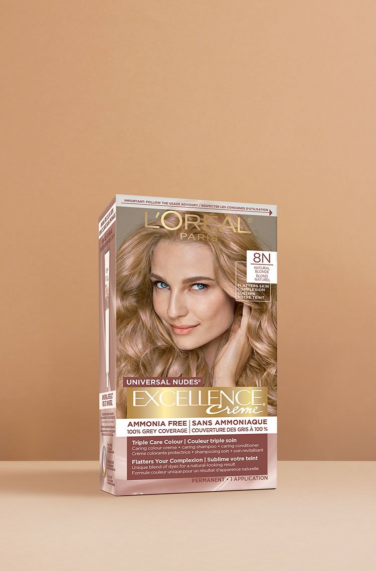 L'Oréal Excellence Crème Universal Nudes 8N Light Blonde hair dye box, showcasing a smiling woman with voluminous, wavy light blonde hair.
