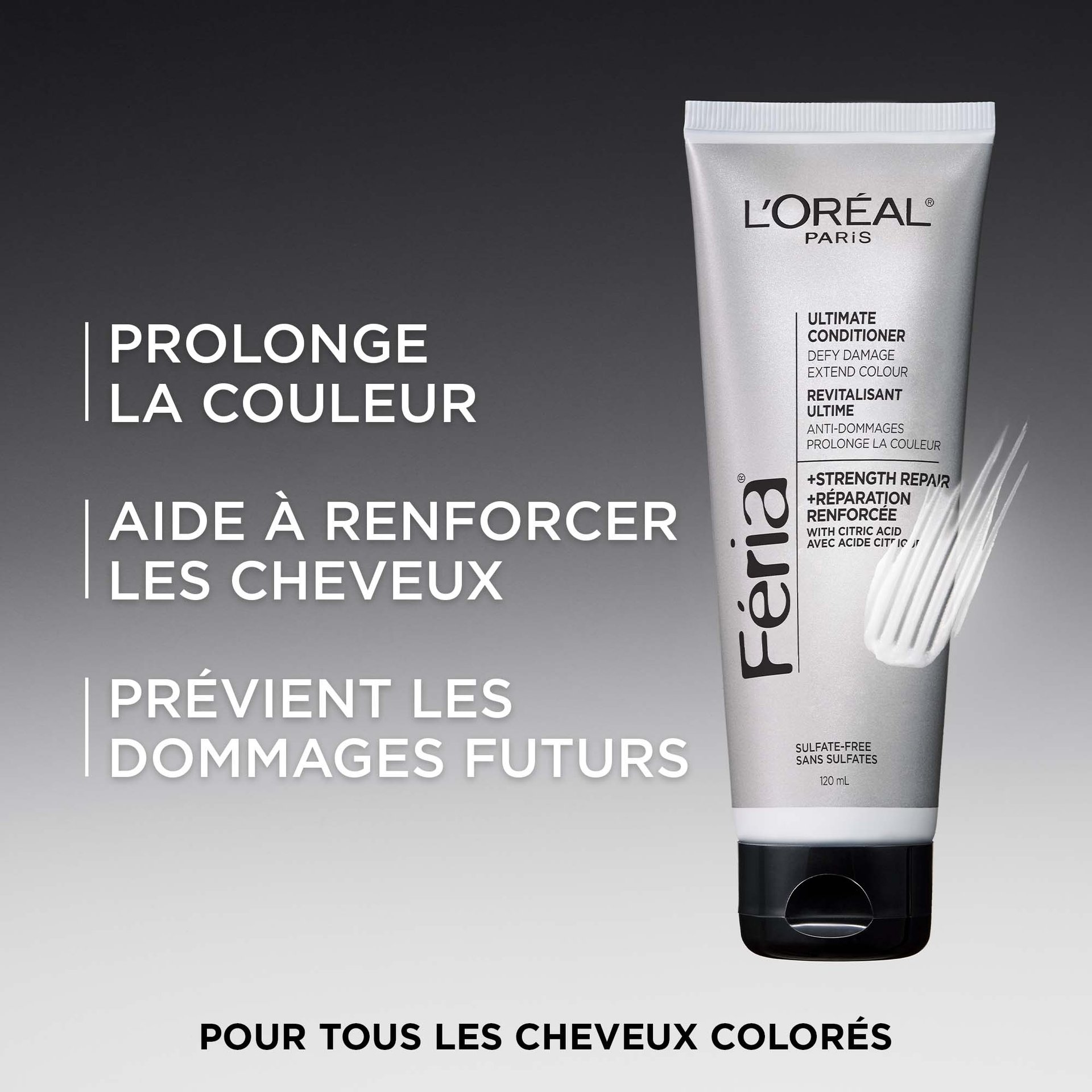 Tube du Revitalisant Ultime Féria de L'Oréal Paris, en emballage argenté avec un bouchon noir, sur fond dégradé sombre. Le texte superposé met en avant trois bénéfices clés : « Prolonge la couleur des cheveux », « Aide à renforcer les cheveux » et « Protège des dommages futurs ». Formule +Réparation Renforcée avec acide citrique. Sans sulfates, 120 mL. Mention en bas : « Pour tous les cheveux colorés. »