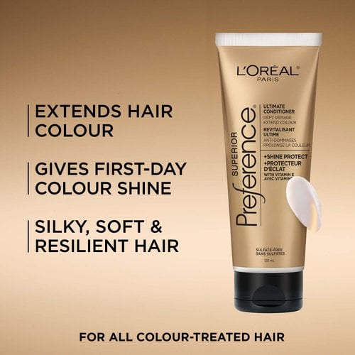 A gold-toned promotional image showing the Superior Preference conditioner tube and a dollop of white cream. To the left, large text lists the product benefits: "EXTENDS HAIR COLOUR," "GIVES FIRST-DAY COLOUR SHINE," and "SILKY, SOFT & RESILIENT HAIR." The bottom text reads, "FOR ALL COLOUR-TREATED HAIR."