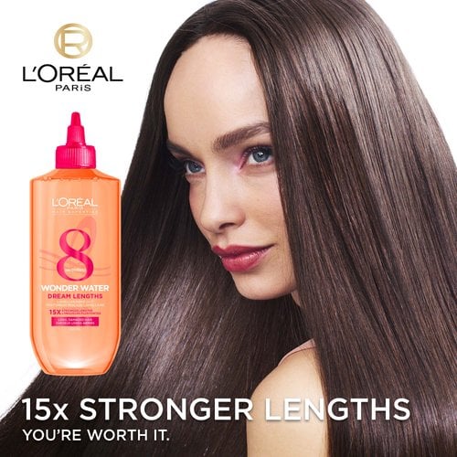 A woman with straight hair 15x stronger with wonder water