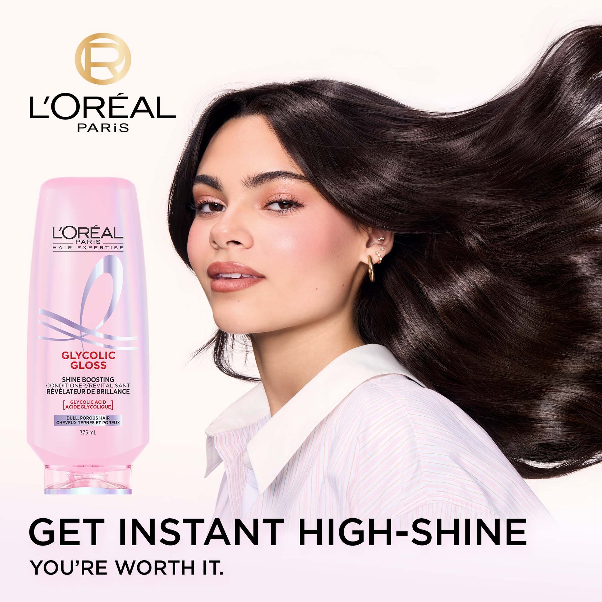 A L'Oréal Paris Glycolic Gloss Shine Boosting Conditioner bottle (375 mL) stands next to a model from behind, showcasing her long, dark, incredibly shiny, and smooth hair. The text "GET NEXT-LEVEL SHINE YOU'RE WORTH IT." is visible at the bottom.