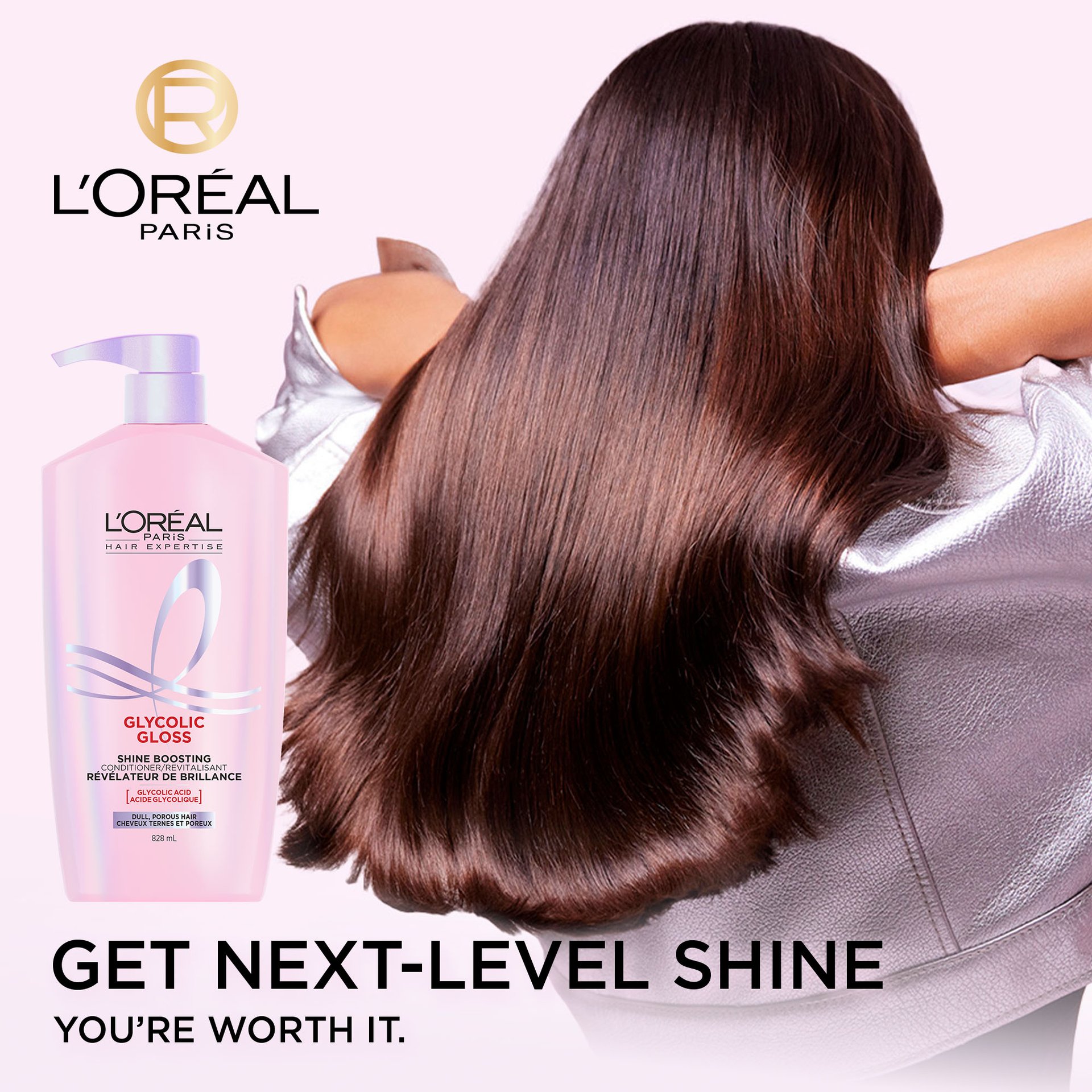 A L'Oréal Paris Glycolic Gloss Shine Boosting Conditioner bottle stands next to a model from behind, showcasing her long, dark, incredibly shiny, and smooth hair. The text "GET NEXT-LEVEL SHINE YOU'RE WORTH IT." is visible at the bottom.