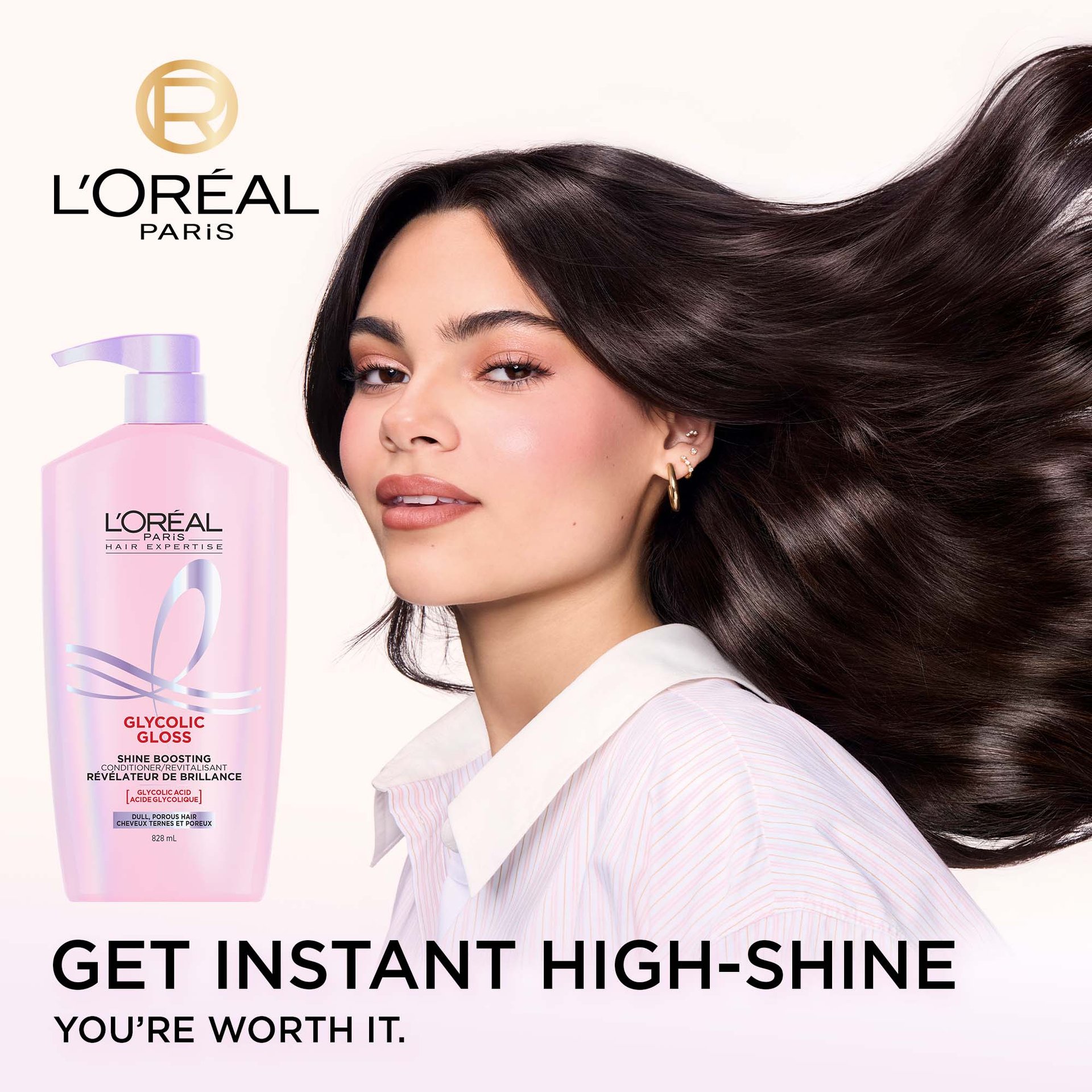 A L'Oréal Paris Glycolic Gloss Shine Boosting Conditioner bottle stands next to a model from behind, showcasing her long, dark, incredibly shiny, and smooth hair. The text "GET NEXT-LEVEL SHINE YOU'RE WORTH IT." is visible at the bottom.