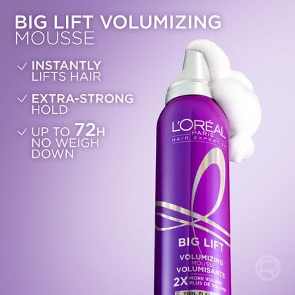 A purple Hair Expertise Collagen Peptide Lifter Big Lift mousse can displayed on a light purple background with dollops of white foam, featuring text: "BIG LIFT VOLUMIZING MOUSSE, INSTANTLY LIFTS HAIR, EXTRA-STRONG HOLD, UP TO 72H NO WEIGH DOWN".