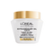 A studio shot of the white jar of L'Oréal Paris Hair Expertise Extraordinary Oil Coco Light Oil Hair Mask on a white background, featuring a shiny gold lid.