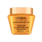 A studio shot of the gold translucent jar of L'Oréal Paris Hair Expertise Extraordinary Oil Hair Oiling Mask on a white background, featuring a shiny gold metallic lid.