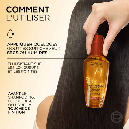 Une main tenant le flacon de L'Oréal Paris Huile Extraordinaire Jojoba contre des cheveux foncés, lisses et brillants. À gauche, un guide d'utilisation indique « Appliquer quelques gouttes sur cheveux humides ou secs, insister sur les longueurs et les pointes, avant le coiffage ou en touche finale ».