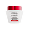 A studio shot of the white jar of L'Oréal Paris Hair Expertise Total Repair 5 Hair Rescue Hair Mask on a white background, featuring a shiny red lid.