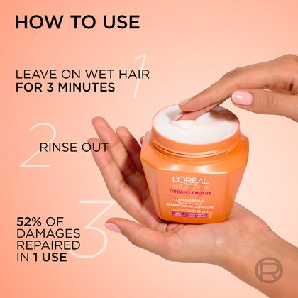 Hands holding the orange hair mask jar and taking a scoop of white cream. On the left, step-by-step instructions read: "How to use: 1. Apply on wet hair for 3 minutes, 2. Rinse out, 3. 52% of damages repaired in 1 use".