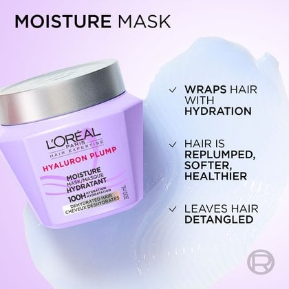 Close-up of the L'Oréal Paris Hyaluron Plump hair mask on a smooth, wavy purple cream background. Text highlights: "Moisture Mask: Wraps hair with hydration, hair is replumped, softer, healthier, leaves hair detangled".