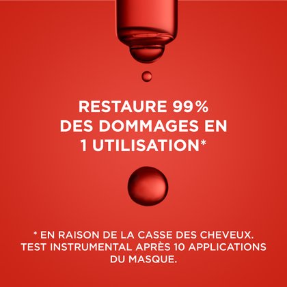 Une seule goutte de liquide coulant d'une pipette sur fond rouge. Le texte indique : « Restaure 99 % des dommages en une seule utilisation. *Dû à la casse, test instrumental après 10 applications du masque. »
