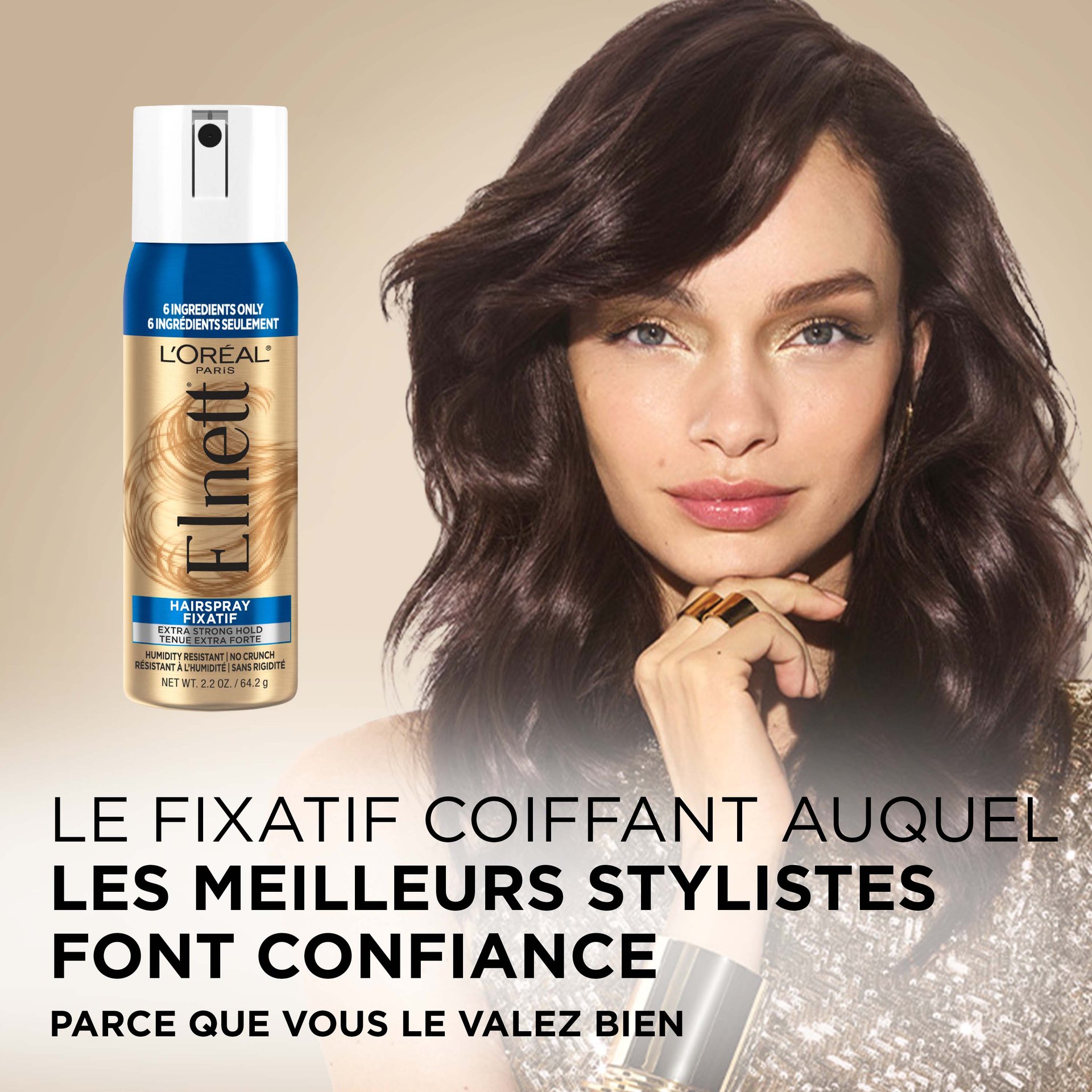 Une femme avec un brushing qui tient et une laque elnett