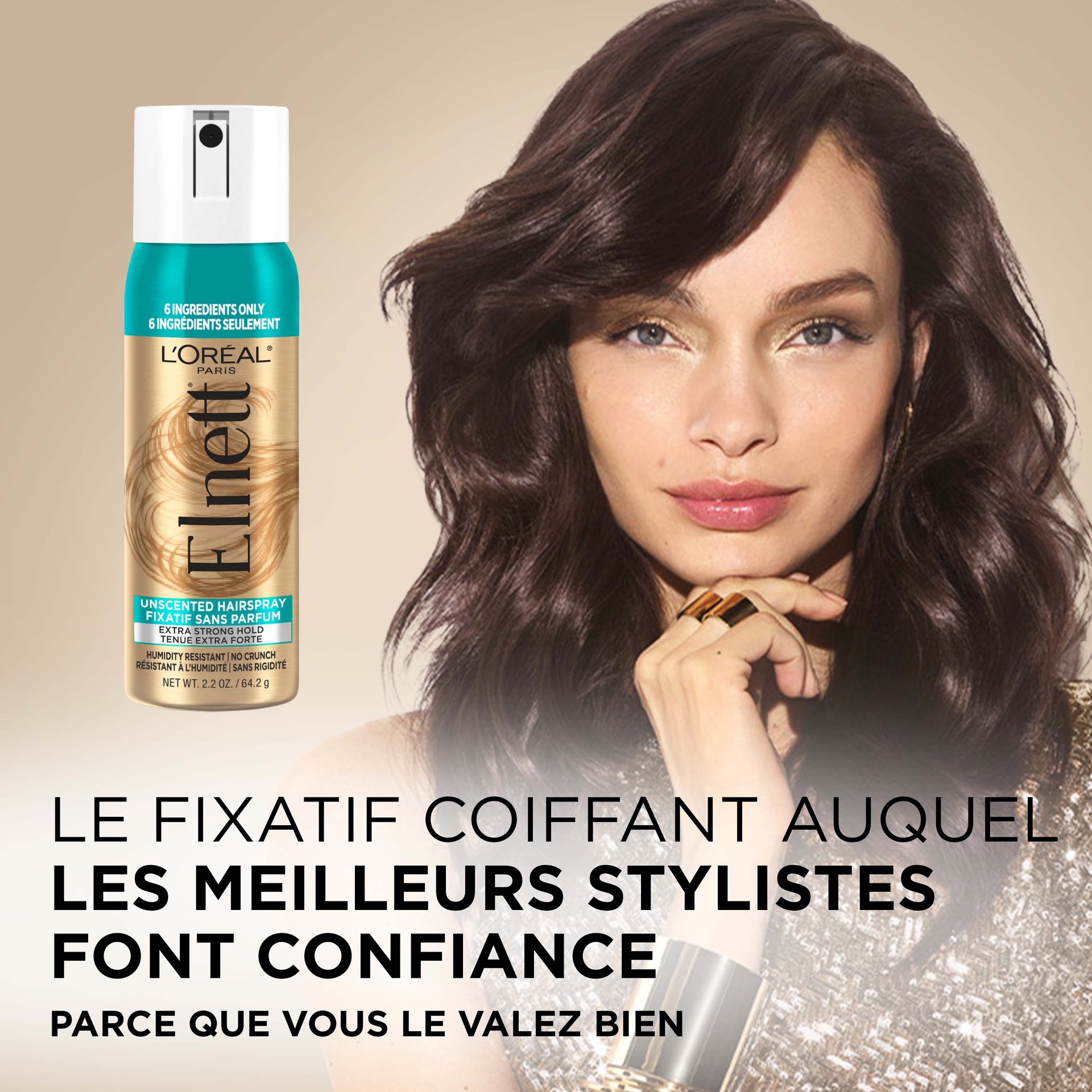 Une femme avec un brushing qui tient et une laque elnett