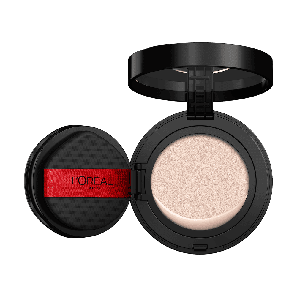 An open L'Oréal cushion foundation compact, black with a red L'Oréal Paris logo on the puff, revealing a light beige foundation in the cushion