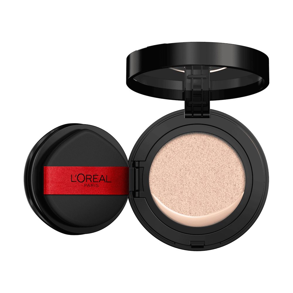 An open L'Oréal cushion foundation compact, black with a red L'Oréal Paris logo on the puff, revealing a light beige foundation in the cushion