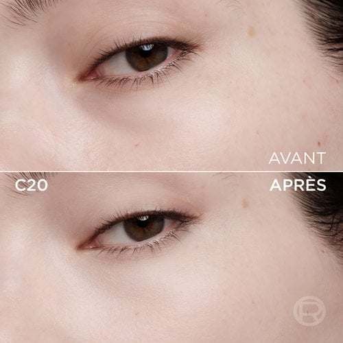 Image divisée comparant la zone sous l'œil gauche d'une personne. La partie supérieure, étiquetée 'BEFORE' (Avant), montre une peau claire avec quelques petites taches et imperfections. La partie inférieure, étiquetée 'C20' et 'AFTER' (Après), présente la même zone du visage avec une peau visiblement plus lisse, plus unifiée et sans imperfections, suggérant l'effet d'un produit cosmétique. Un discret logo 'R' est visible en bas à droite de la section 'APRÈS'
