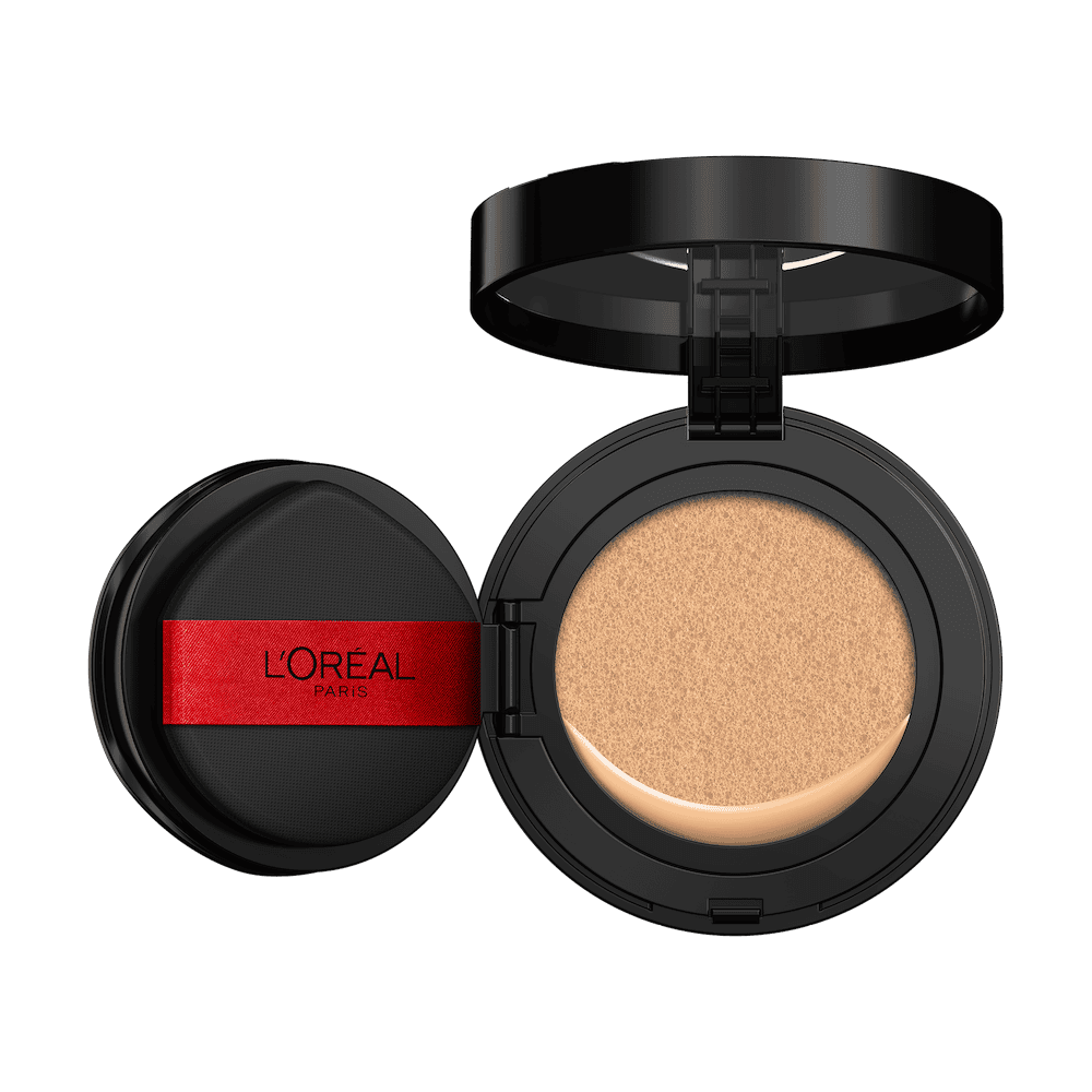 An open L'Oréal cushion foundation compact, black with a red L'Oréal Paris logo on the puff, revealing a light beige foundation in the cushion