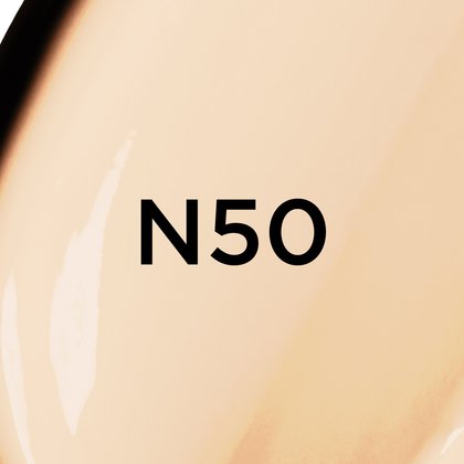 A close-up of a light, neutral beige creamy foundation or cosmetic texture with the bold black text 'N50' centered on the image, likely indicating a product shade