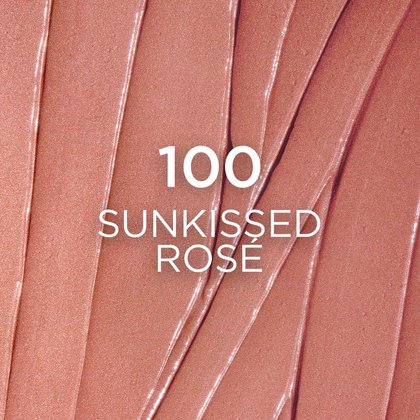 A close-up, textured swatch of blush in shade '100 Sunkissed Rose', displaying a soft, rosy-brown color with a creamy finish, showing distinct swirls in the product.