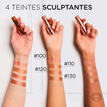 Trois bras avec des tons de peau variés, du clair au foncé, présentant des échantillons de quatre teintes sculptantes : #100 (rose), #110 (bronze doré), #120 (bronze cuivré) et #130 (brun doré profond). Chaque bras tient un stick L'Oréal Lumi Bronze, illustrant les différentes couleurs appliquées sur la peau