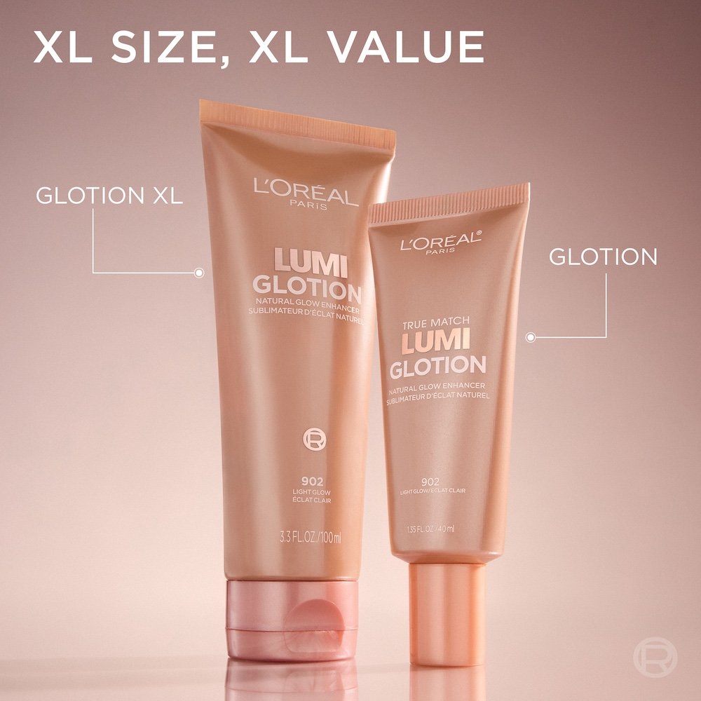 Two tubes of L'Oréal Paris Lumi Glotion, Natural Glow Enhancer, are displayed side-by-side on a soft pink background. The larger tube on the left is labeled 'GLOTION XL' and contains 3.3 FL. OZ. / 100 ML. The smaller tube on the right is labeled 'GLOTION', includes 'TRUE MATCH Lumi Glotion', and contains 1.35 FL. OZ. / 40 ML. Both are in shade 902 Light Glow. The text 'XL SIZE, XL VALUE' is prominently displayed at the top of the image."