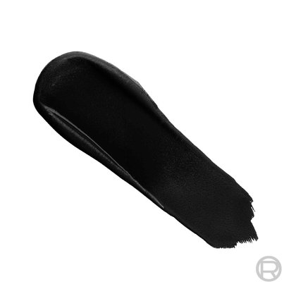 An e-commerce texture shot showing a large, textured swatch of the "All Night Black" creamy pigment.