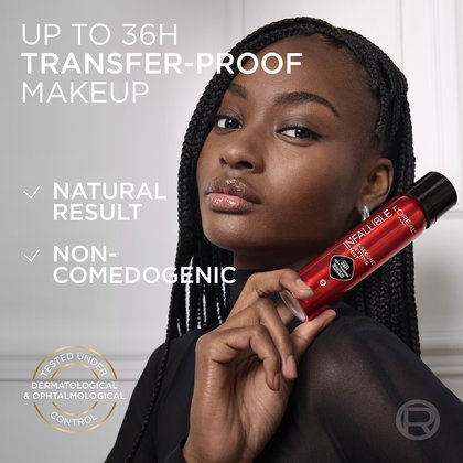 A headshot of a smiling woman with dark braided hair, holding a red "L'Oréal Infallible 3-Second Setting Mist" bottle. White text overlays highlight the product's benefits: "UP TO 36H TRANSFER-PROOF MAKEUP," "NATURAL RESULT," "NON-COMEDOGENIC," and "TESTED UNDER DERMATOLOGICAL & OPHTALMOLOGICAL CONTROL," with a circular gold seal.