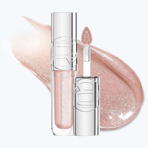 A professional product packshot of the Plump Ambition Lip Oil in shade "117 nude lights" shown upright.