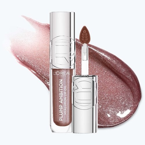 A professional product packshot of the L'Oréal Paris Plump Ambition Hyaluron Lip Oil in a shimmering brown-mauve shade, shown upright with its silver-capped bottle and plush pillow applicator featuring the shimmering pigment.