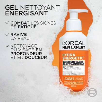 Le flacon du Nettoyant Hydra Energetic est représenté partiellement immergé dans une épaisse mousse blanche. Trois points à gauche indiquent : « COMBAT LES SIGNES DE FATIGUE », « RAFRAÎCHIT LA PEAU » et « NETTOYAGE DU VISAGE PROFOND MAIS DOUX ».