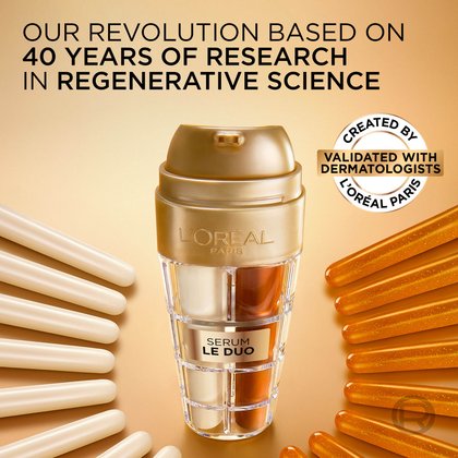 The L'Oréal Paris Age Perfect Serum Le Duo bottle surrounded by golden and white scientific-looking capsule shapes. Text highlights the brand's commitment: "Our revolution based on 40 years of research in regenerative science," "Created by," and "Validated with dermatologists."