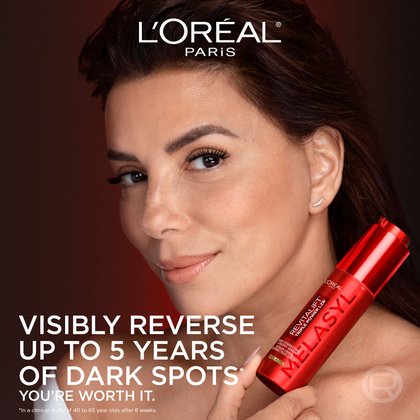 Actress Eva Longoria holds the red bottle of L’Oréal Paris Revitalift Triple Power LZR Melasyl Serum. Text reads: "Visibly reverse up to 5 years of dark spots."